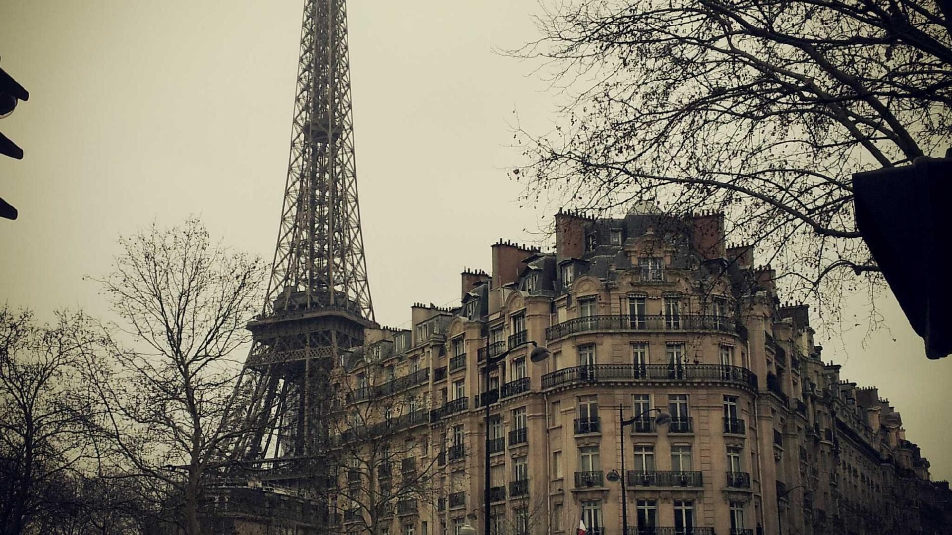 A panoramic view of a modern city skyline at dusk, representing Ahmedabad's growth.